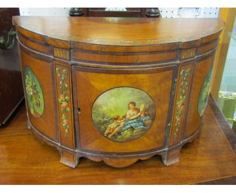 SHERATON DESIGN, painted satinwood apprentice piece, in form of demi-lune commode with central painted panel, after Kauffman,
