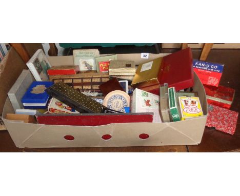 Collection of playing cards, cribbage boards and sets of dominoes