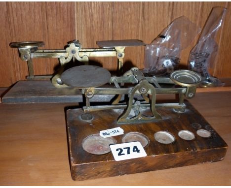 Two Victorian brass postal scales with weights