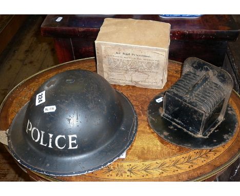 WW2 Civil Defence police steel helmet, a WW2 black-out headlight cover and an ARP gas mask