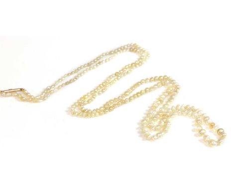 A single row graduated pearl necklace, c.1920,with graduated baroque and semi-baroque pearls, untested, 2.20 to 5.10mm in siz