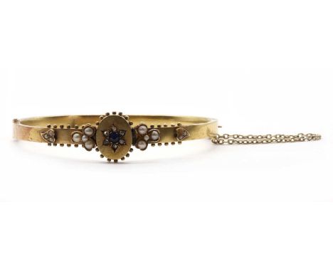 A gold sapphire, diamond and split pearl bangle, the upper half with a sapphire and rose cut diamond cluster grain set to an 