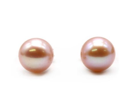 A pair of gold cultured freshwater pearl stud earrings,a peach/pink cultured freshwater pearl, approximately 9mm, cup set to 