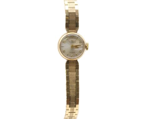 A ladies' 9ct gold Lanco mechanical bracelet watch, 17mm diameter with a silvered dial and alternating Arabic numerals and ba