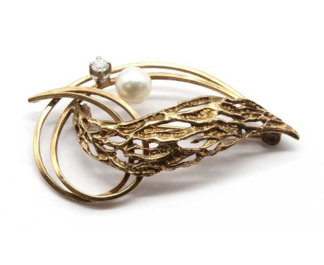 A 9ct gold diamond and cultured pearl spray brooch,with pin and roller catch, import hallmark London, possibly 1961, 50mm wid