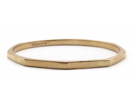A 9ct gold hollow bangle, nine sided, Birmingham 1926, internal diameter 68-70mm, 11.74gCondition ReportTwo solder joins visi