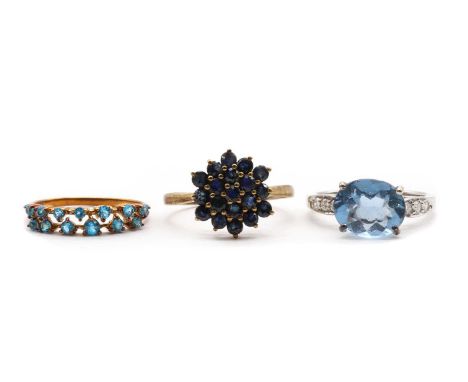 Three 9ct gold rings,comprising a two row apatite ring, Birmingham, a sapphire cluster ring, Birmingham 2010, and a white gol