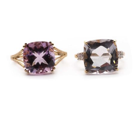 Two 9ct gold amethyst rings,one with diamond set shoulders, Birmingham and Birmingham 2010, 6.41g total (2)Finger size N, N½C