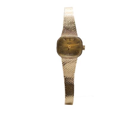 A ladies' 9ct gold Rotary mechanical bracelet watch, a cushion shaped case with gilt dial and baton hour markers, to integral