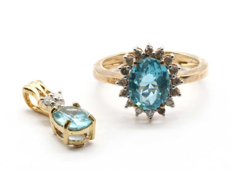 A 9ct gold apatite and diamond cluster ring,an oval mixed cut apatite, approximately 9 x 7mm, to surround of brilliant cut di
