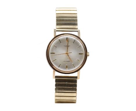 A gentlemen's 9ct gold Benson mechanical bracelet watch, 34mm diameter with a silvered dial and baton hour markers, to after 