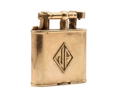 An Art Deco 9ct gold Dunhill lighter, of ovoid form with applied initals 'JF', marked to the base 'Dunhill Unique Lighter', P