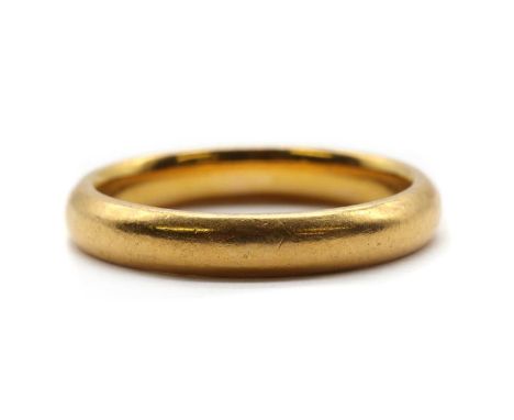 A 22ct gold wedding ring,Birmingham 1925, 4.58g.Finger size L½Condition ReportSurface marks/scratches.