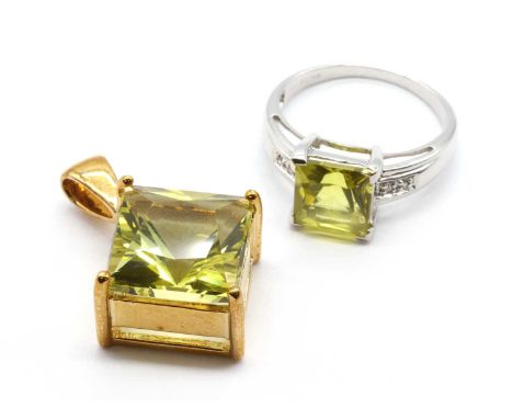 A 9ct white gold lemon quartz and diamond ring,a square mixed cut lemon quartz, approximately 8mm, to shoulders grain set wit