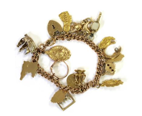 A gold charm bracelet,a 9ct gold curb link bracelet with heart shaped padlock clasp and half solid bolt ring, London 1965, su