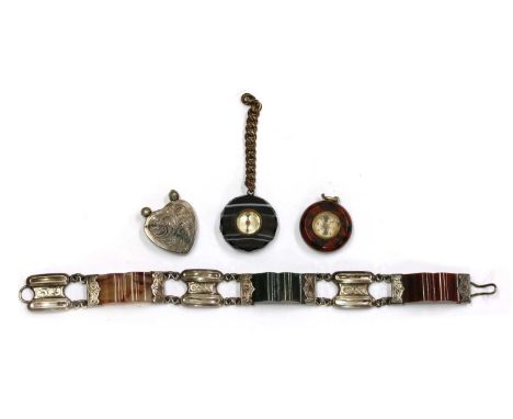 A Victorian silver and Scottish agate bracelet,with carved agate, bloodstone and jasper links with silver end caps, joined by