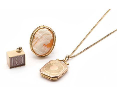 A small collection of jewellery, to include a 9ct gold rectangular locket with engine turned decoration, suspended on a gold 