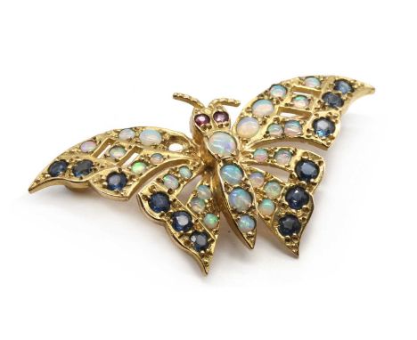 A 9ct gold opal, sapphire and ruby butterfly brooch,one opal deficient, to pin and roller catch, London, common control mark,