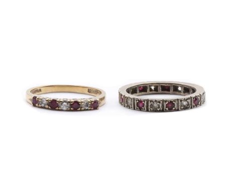 A 9ct gold ruby and diamond half eternity ring, London,together with a gold sythetic spinel full eternity ring, tested as app