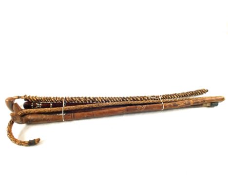 A 19th Century French twisted cane and wire walking stick, a spiral bound quill walking stick, possibly Indian with horn grip