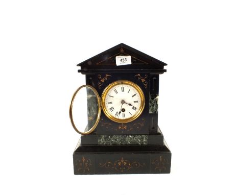 A black slate mantel clock