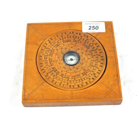 A Chinese wood surround compass