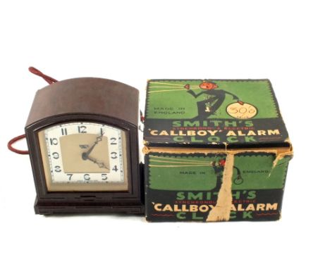 A vintage Smiths Call Boy alarm clock with a Walnut Bakelite finish, in original box
