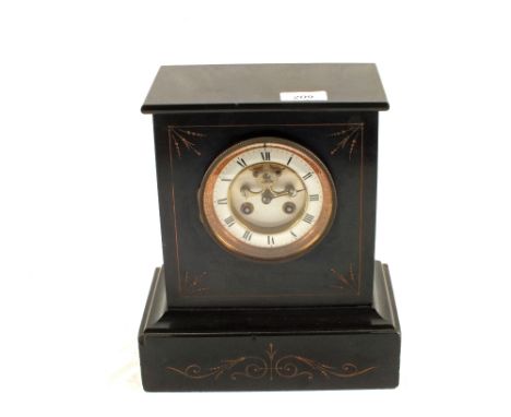 A black slate mantel clock
