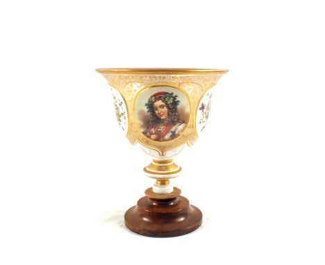 A 19th Century Bohemian glass vase with flower painted oval panels, one with girls portrait (truncated on later base)