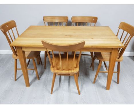 Light oak rectangular shaped dining table and 5 matching chairs