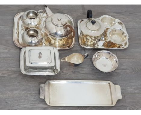 Silver plated items to include a four piece tea set by Sheffield plate, another "Plato" tea set, Walker &amp; Hall cream jug,