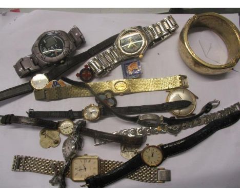 Wristwatches to include Accurist, Rotary and others, along with six enamelled badges 