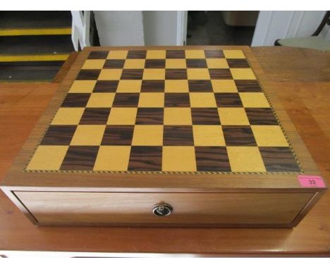 An inlaid wooden chessboard and box, designed by Malcolm Bowmer exclusive to the Snuff Boss Co Ltd for the Geoff Chess set (c