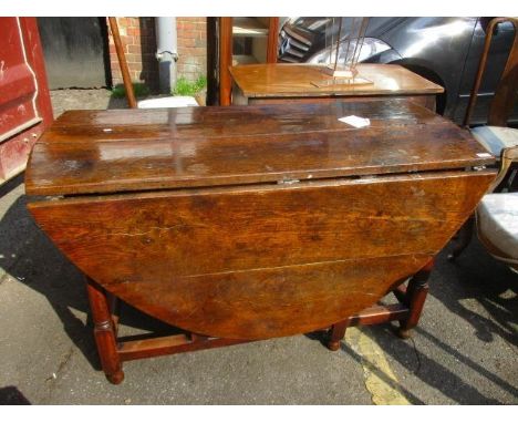 A Georgian II oak gate leg table 30"h x 53"w 