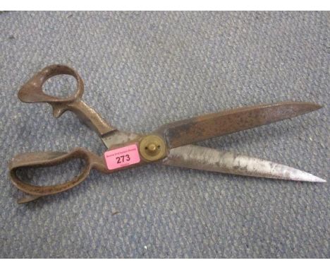 A pair of large and early 19th century tailor's scissors inscribed R Heinisch 