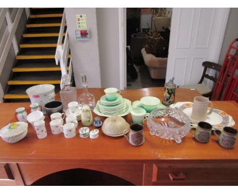 A mixed lot of ceramics and glassware to include a Shelley green horizontal banded part teaset, a Wilkinson Ltd Clarice Cliff