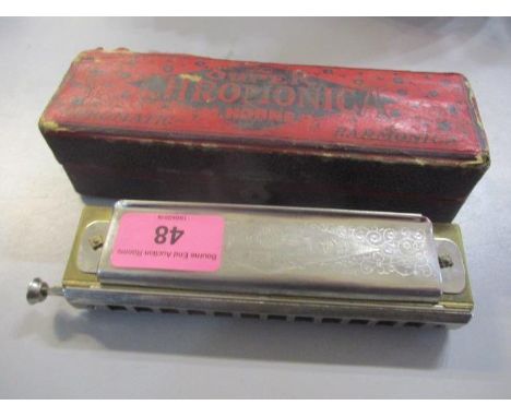 A Super Chromonica Hohner harmonica 