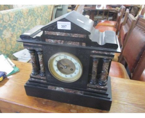A Victorian marble mantle clock of architectural design, fitted with a French 8 day movement, 12 3/4"h x 13 1/2"w 