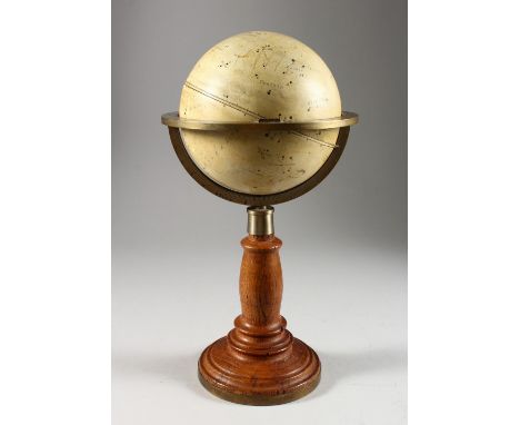 G. LECOQ. French, 19th century. A TABLE GLOBE OF THE STARS, 5.5ins diameter x 15ins high, on a stand with brass band and numb