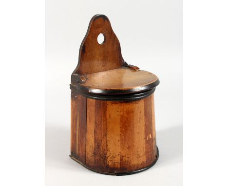 A DUTCH HANGING SALT BOX, with ladle.