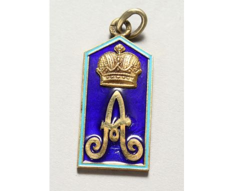A RUSSIAN SILVER PENDANT, enamel decorated with a crown and letter "A". 1.5ins high.