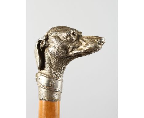 A CAST PLATE DOG'S HEAD WALKING STICK HANDLE.