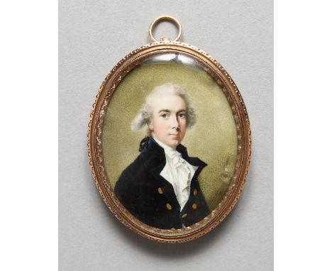 A GEORGIAN OVAL PORTRAIT MINIATURE OF A YOUNG GENTLEMAN, blue coat and white cravat. Image: 1 3/8ins x 1.25ins.