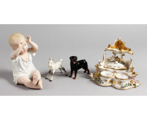 A BISQUE PORCELAIN SEATED BABY, a porcelain inkwell, a Beswick dog and Beswick horse.