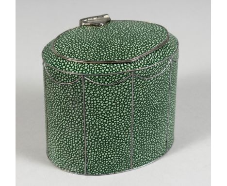 A GEORGE III DESIGN SHAGREEN OVAL TEA CADDY. 4ins high.