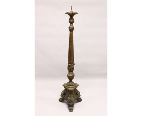 A LARGE, CONTINENTAL CARVED AND PAINTED CHURCH STYLE CANDLE OR LAMP BASE. 5ft 2ins high.