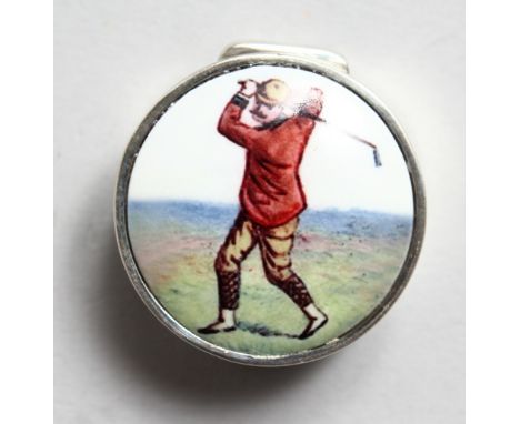 A SMALL SILVER CIRCULAR PILL BOX, the lid with an enamel of a golfer.