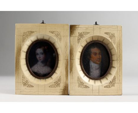 A PAIR OF MINIATURE PORTRAIT BUSTS. 5.25ins x 4ins.