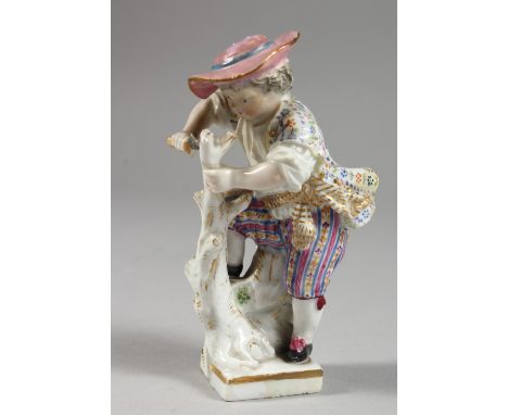 A SMALL MEISSEN PORCELAIN FIGURE OF A YOUNG BOY cutting a stick. Cross swords mark in blue. 4ins high.