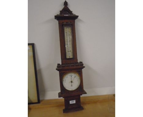 Wall barometer in oak case, 30" high by Joseph Davis &amp; Co, London